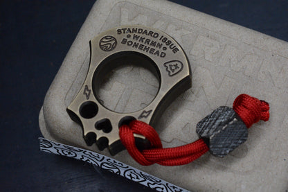 NEW WKRMN Bonehead Derpy 1/4lb Paper Weight Brass w/ Etched Brass Bead