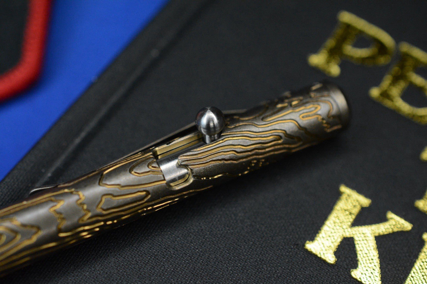 RARE Triple Aught Fellhoelter Ti-Bolt Custom Topo Brass Pen w/Skull TAD Patch
