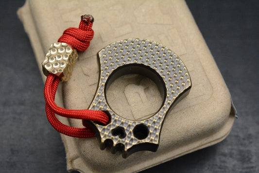 NEW WKRMN Bonehead Weave Finish 1/4lb Paper Weight Brass w/Rock Bead