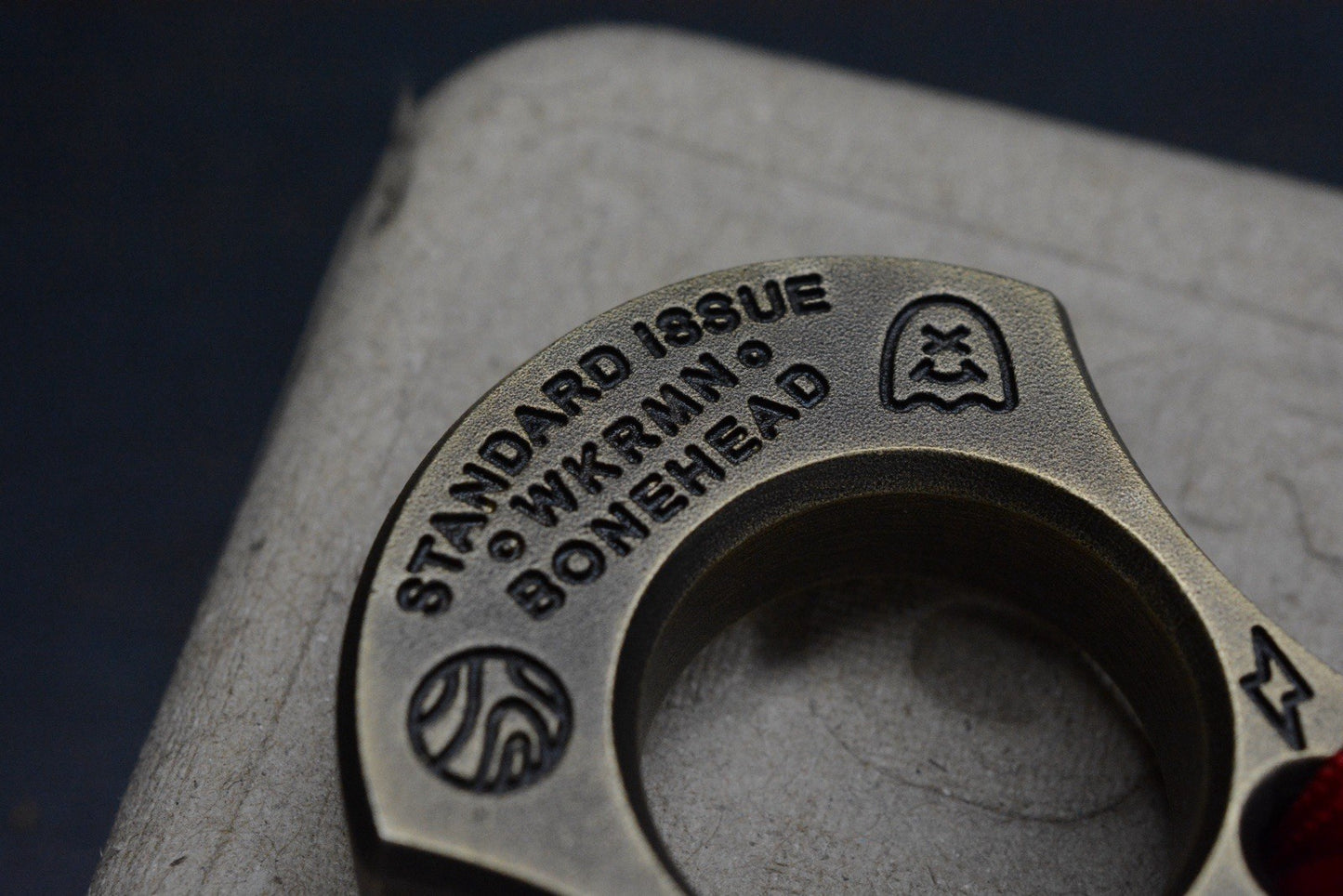 NEW WKRMN Bonehead Cyborg 1/4lb Paper Weight Brass w/ Brass Bead Re Microtech