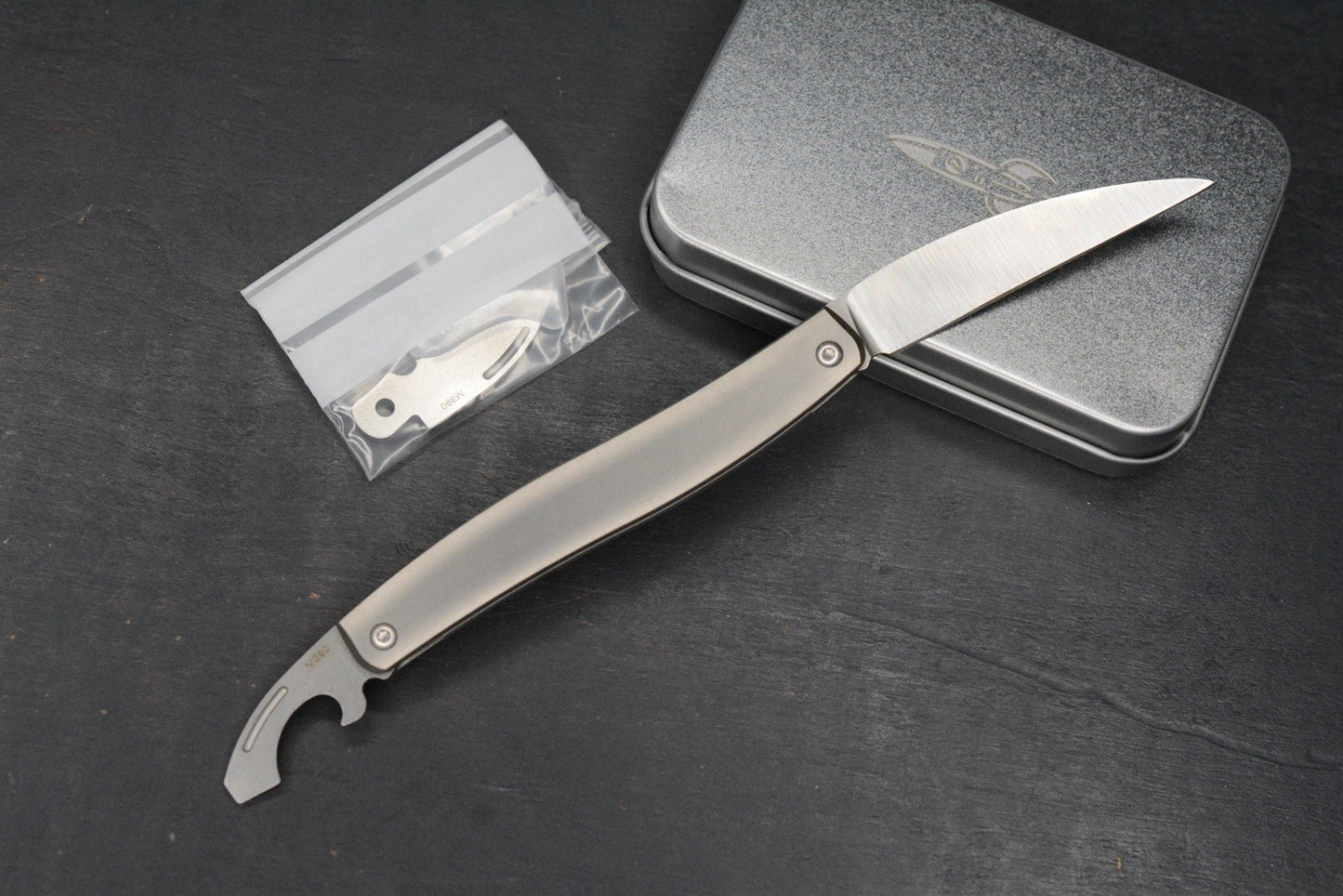 NEW D Rocket Designs Serpentine Slipjoint Ti M390 Wharncliffe Bottle Opener