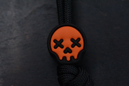 NEW Wkrmn Bonehead Resin Cast Orange/ Black Bottle Opener w/ Wkrmn Skull Bead