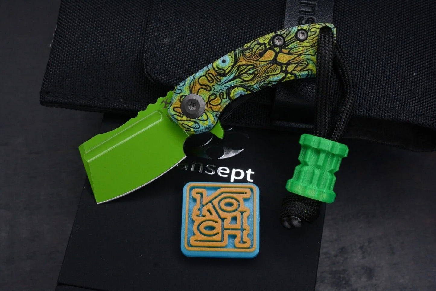 Koch x Kanscept Mini Korvid Undead G10 Green Blade w/ Koch Shamrock Bead & Patch