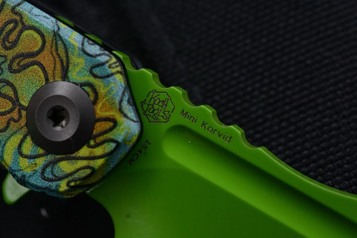 Koch x Kanscept Mini Korvid G10 Undead Green Blade w/Koch St. Paddy Patch & Bead