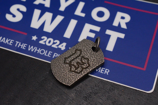 RARE Taylor Swift “13” Dog Tag Titanium w/ Taylor Swift For President Decal